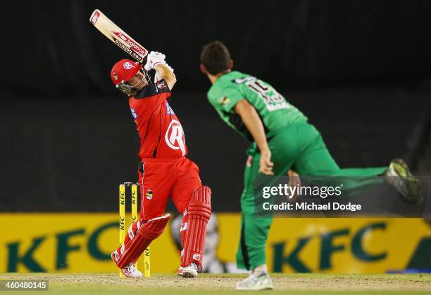 Aaron Finch of the Renegades hits a six off Clint McKay of the Stars during the Big Bash League match between the Melbourne Renegades and the...