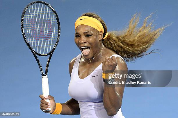Serena Williams of the USA celebrates victory after winning her finals match against Victoria Azarenka of Belarus during day seven of the 2014...