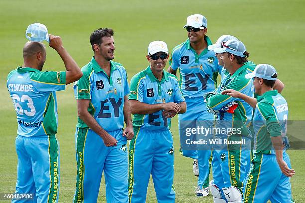 Michael Kasprowicz of the Legends XI celebrates after taking the wicket of Hilton Cartwright of the Scorchers during the Twenty20 match between the...