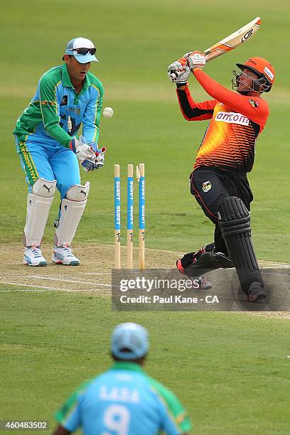 Sam Whiteman of the Scorchers gets bowled by Andrew Symonds of the Legends XI during the Twenty20 match between the Perth Scorchers and Australian...