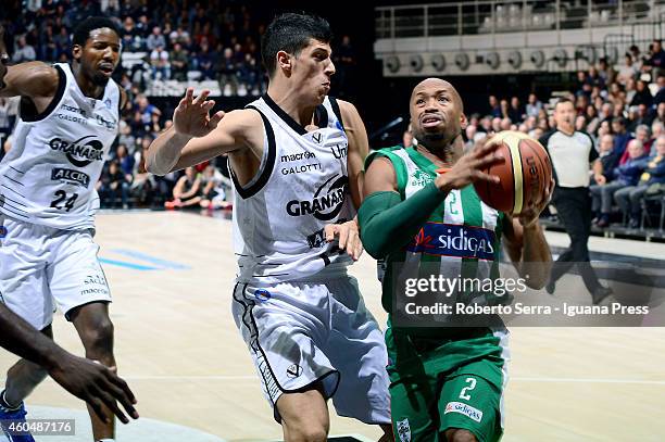 Sundiata Gaines of Sidigas competes with Simone Fontecchio of Granarolo during the LegaBasket serie A1 match between Virtus Granarolo Bologna and...