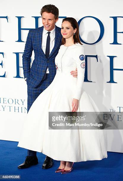 Eddie Redmayne and Felicity Jones attend the UK Premiere of 'The Theory Of Everything' at Odeon Leicester Square on December 9, 2014 in London,...