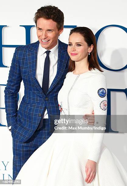 Eddie Redmayne and Felicity Jones attend the UK Premiere of 'The Theory Of Everything' at Odeon Leicester Square on December 9, 2014 in London,...