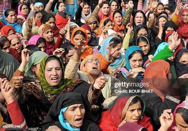 Members of Jammu and Kashmir Coordination Committee of All India Trade Union Congress shouts anti- government slogans during a protest against a rise...