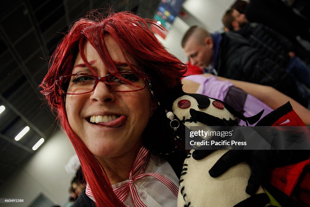 A cosplayer on a day dedicated to the world of comics in...