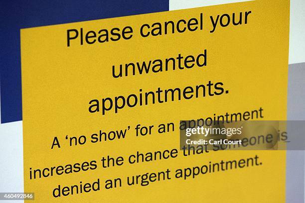 Notice is pictured in the waiting area of a General Practitioners surgery on December 4, 2014 in London, England. Ahead of next years general...