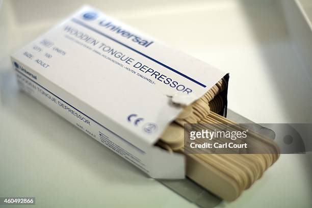 Surgical tongue depressors are pictured in a refrigerator in a General Practitioners surgery on December 4, 2014 in London, England. Ahead of next...