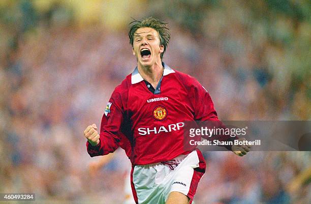 David Beckham of Manchester United celebrates after scoring the third goal in the 1996 FA Charity Shield between Manchester United and Newcastle...