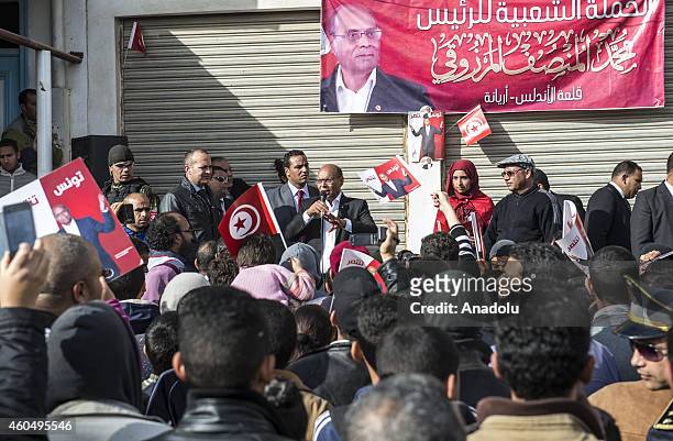 Incumbent President of Tunisia and presidential candidate Mohamed Moncef Marzouki gives a speech during his visit to northern Kalaat el-Andalous...