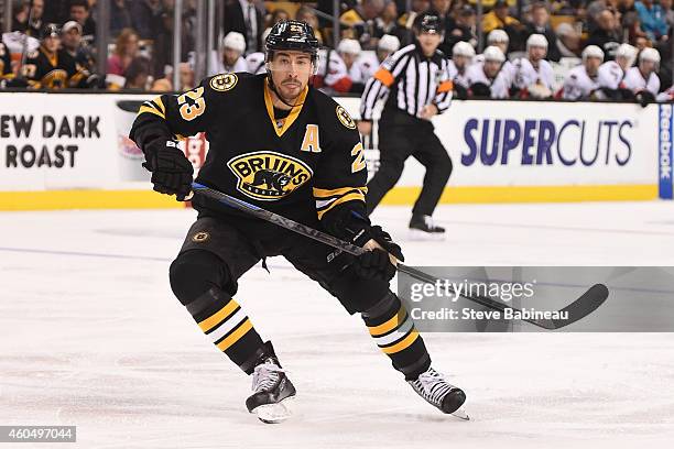 Chris Kelly of the Boston Bruins skates against the Ottawa Senators at the TD Garden on December 13, 2014 in Boston, Massachusetts.