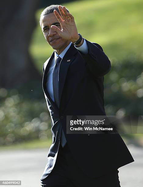 President Barack Obama waves as he departs the White House December 15, 2014 in Washington, DC. Obama is scheduled to travel to New Jersey later in...