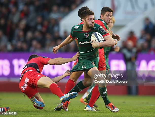 Owen Williams of Leicester runs with the ball during the European Rugby Champions Cup pool three match between RC Toulon and Leicester Tigers at...