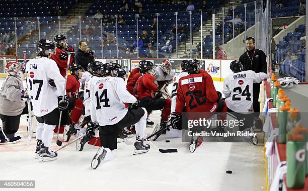Assistant Coach Scott Walker talks to the players during the Canada National Junior Team practice at the Meridian Centre on December 15, 2014 in St...