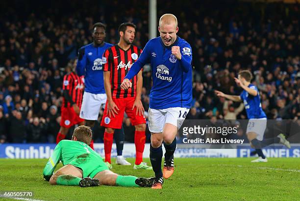 Steven Naismith of Everton celebrates scoring their third goal during the Barclays Premier League match between Everton and Queens Park Rangers at...