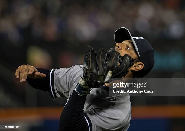 Brian Roberts of the New York Yankees catches a pop-up during the game against the New York Mets at Citi Field on Wednesday, May 14, 2014 in the...