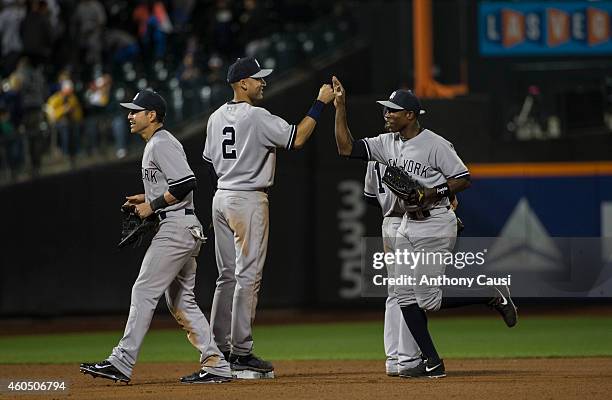 Members of the New York Yankees celebrate the win over the New York Mets at Citi Field on Wednesday, May 14, 2014 in the Queens borough of New York...