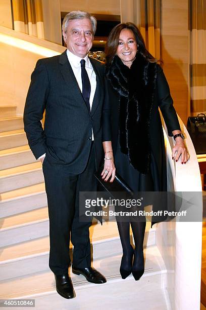 Dior Sidney Toledano, his wife Katia and Chief Executive Officer of Louis Vuitton, Michael Burke attend the Louis Vuitton Montaigne Store Re-Opening...