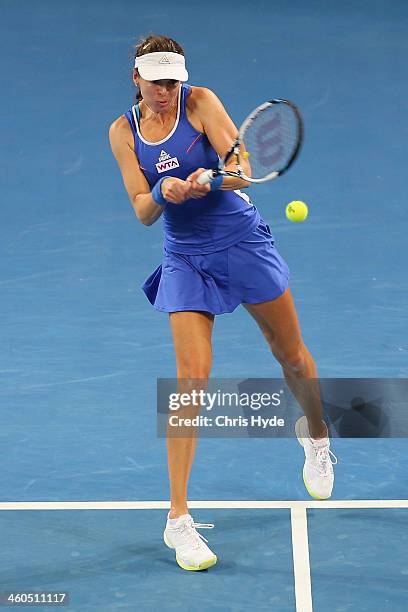 Galina Voskoboeva of Kazakhstan plays a backhand in her doubles final partnered with Kristina Mladnovic of France against Anastasia Rodionova of...