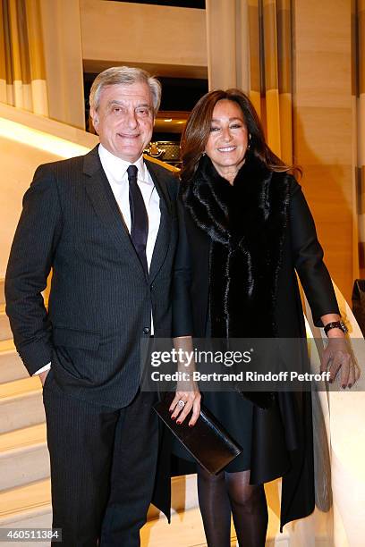 Dior Sidney Toledano and his wife Katia attend the Louis Vuitton Montaigne Store Re-Opening party at Louis Vuitton Avenue Montaigne Store on December...