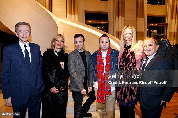 Owner of LVMH Luxury Group Bernard Arnault, his wife Helene Arnault, Fashion Designer of Louis Vuitton, Nicolas Ghesquiere, Fashion Designer of Louis...
