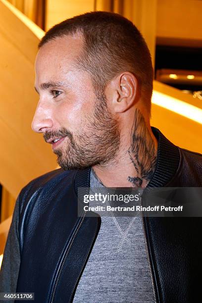 Actor Matthias Schoenaerts attends the Louis Vuitton Montaigne Store Re-Opening party at Louis Vuitton Avenue Montaigne Store on December 15, 2014 in...