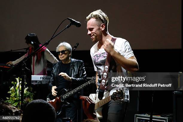 Guitarist of Group Blondie performs during the Louis Vuitton Montaigne Store Re-Opening party at Louis Vuitton Avenue Montaigne Store on December 15,...