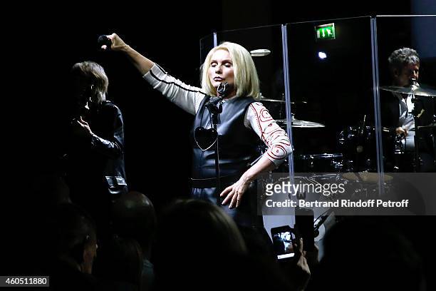 Singer Debbie Harry performs with her Group Blondie during the Louis Vuitton Montaigne Store Re-Opening party at Louis Vuitton Avenue Montaigne Store...