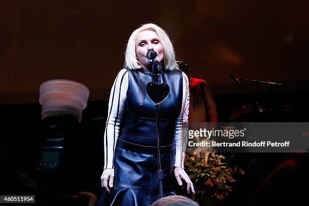 Singer Debbie Harry performs with her Group Blondie during the Louis Vuitton Montaigne Store Re-Opening party at Louis Vuitton Avenue Montaigne Store...