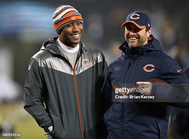 Brandon Marshall and wide receivers coach Mike Groh on the field during pregame warms up before a game against the New Orleans Saints at Soldier...