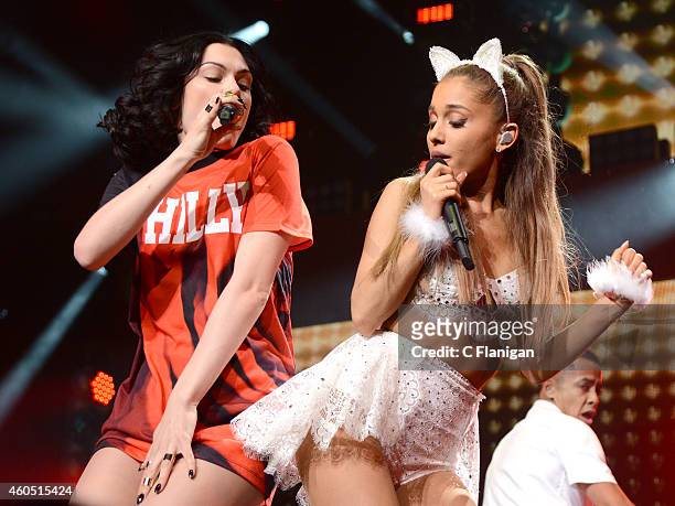 Jessie J and Ariana Grande perform onstage at the Q102's Jingle Ball 2014 at Wells Fargo Center on December 10, 2014 in Philadelphia, Pennsylvania.