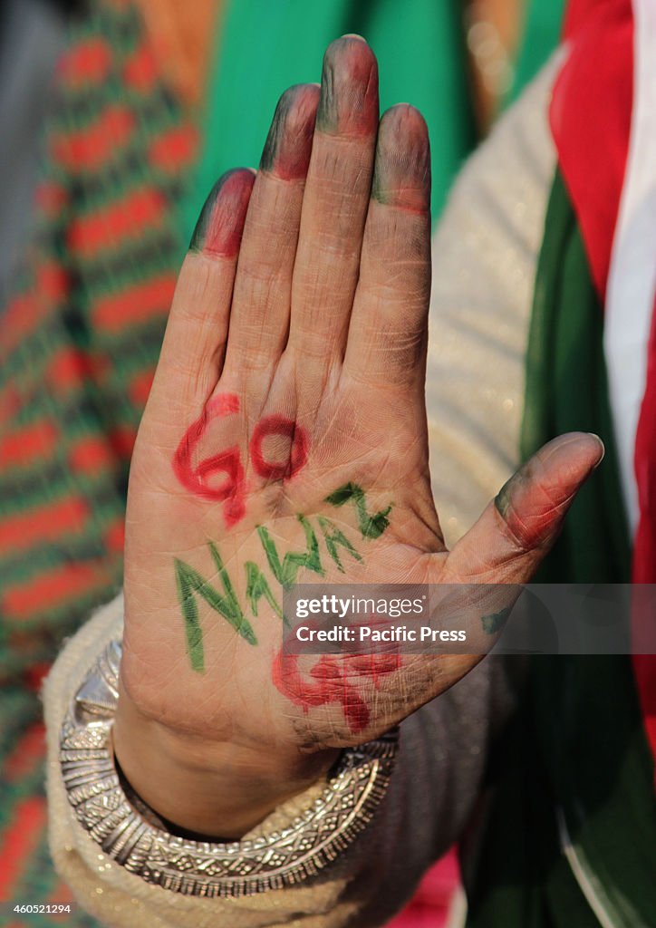 Supporter joins the protest led by the Pakistani cricketer-...