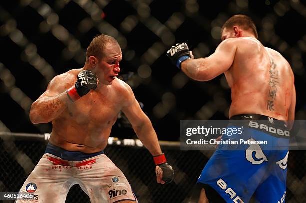 Junior dos Santos and Stipe Miocic square off in their heavyweight bout during the UFC Fight Night event at the at U.S. Airways Center on December...