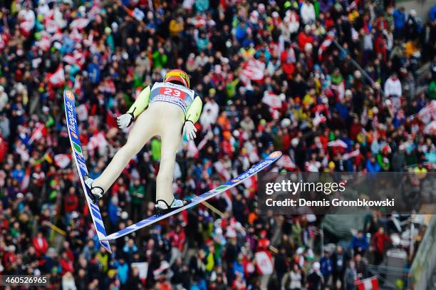Anssi Koivuranta of Finland soars through the air during his first round jump on day 2 of the Four Hills Tournament event at Bergisel on January 4,...