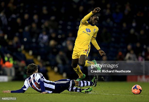 Diego Lugano of West Brom tackles Hiram Boateng of Palace during the Budweiser FA Cup third round match between West Bromwich Albion and Crystal...