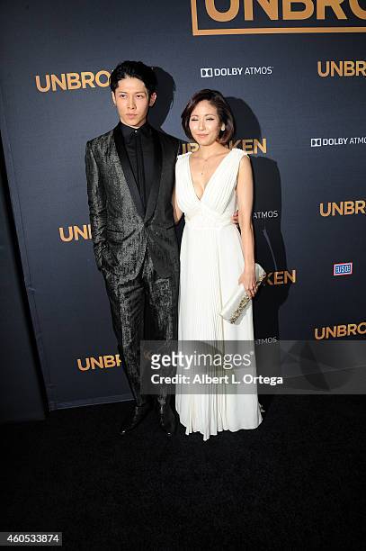 Actor/musician Takamasa Ishihara AKA Miyavi and wife Melody Ishihara arrive for the Premiere Of Universal Studios' "Unbroken" held at The Dolby...