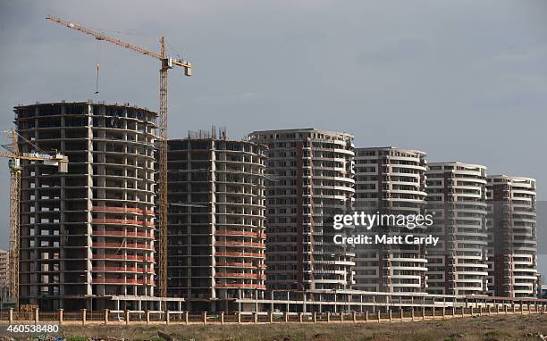 Construction continues on blocks of high rise apartments overlooking Dream City, a new exclusive residential suburb that is being developed in Erbil...