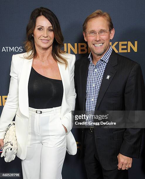 Bart Conner and Nadia Comaneci arrive at the Los Angeles premiere of "Unbroken" at The Dolby Theatre on December 15, 2014 in Hollywood, California.