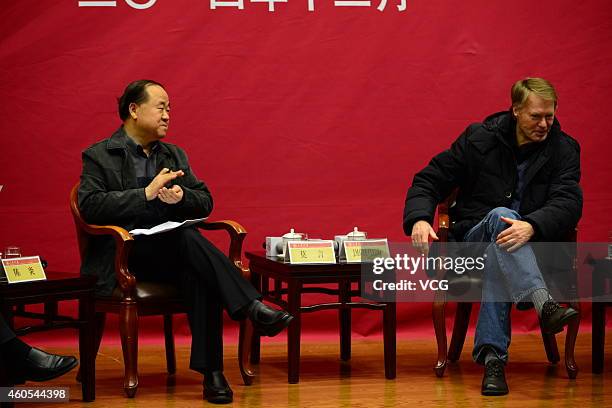 JINAN, CHINA - DECEMBER 16: (CHINA OUT) Chinese Literature Nobel laureate Mo Yan (L) and French Literature Nobel laureate Jean-Marie Gustave Le Clezio hold talks about "Literature and Life" at Shandong University on December 16, 2014 in Jinan, Shandong province of China. French Literature Nobel laureate Jean-Marie Gustave Le Clezio and Chinese Literature Nobel laureate Mo Yan attend a dialogue with the theme of "Literature and Life" on Tuesday in Shandong. (Photo by Visual China Group via Getty Images/Visual China Group via Getty Images) jinan china china out chinese literature
