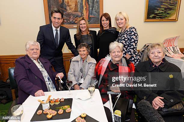 Ed Miliband, Jane Bruton, Editor-in-Chief at Grazia Magazine, Gloria De Piero MP and Unite union leader Jennie Formby pose with real-life Dagenham...