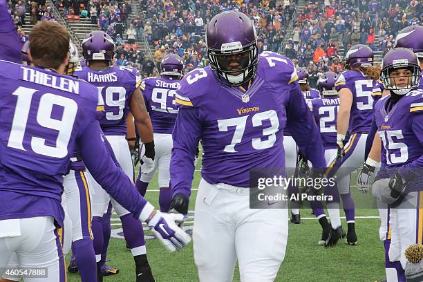 Defensive Tackle Sharrif Floyd of the Minnesota Vikings is introduced against the New York Jets at TCFBank Stadium on December 7, 2014 in...