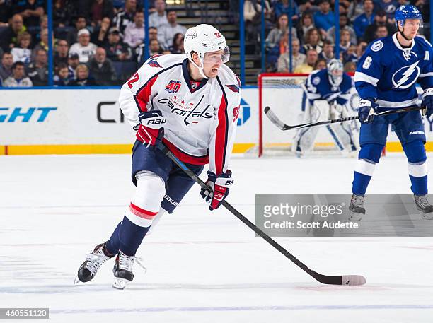 Mike Green of the Washington Capitals skates against the Tampa Bay Lightning the Amalie Arena on December 9, 2014 in Tampa, Florida.