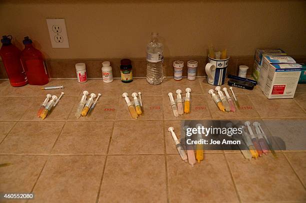 October 07: Janéa Cox stages Haleigh's medications on the kitchen counter before bedtime every day. Since starting on Haleigh's Hope, her daughter...