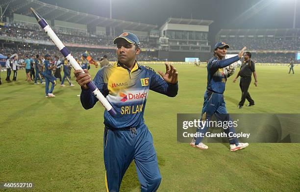 Mahela Jayawardena and Kumar Sangakkara of Sri Lanka wave the crowd after winning the 7th One Day International match between Sri Lanka and England...