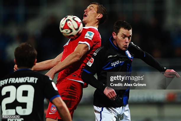 Hanno Balitsch of Frankfurt jumps for a header with Mathias Wittek of Heidenheim during the Second Bundesliga match between FSV Frankfurt and 1. FC...