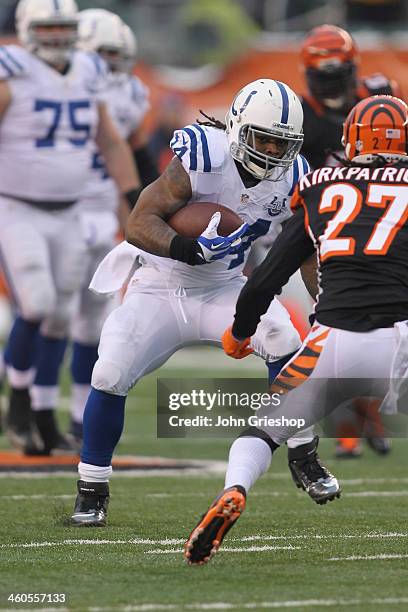 Trent Richardson of the Indianapolis Colts runs the ball upfield during the game against the Cincinnati Bengals at Paul Brown Stadium on December 8,...