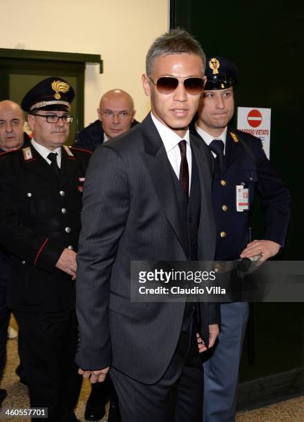 Milan's new signing Keisuke Honda is seen upon arrival at Milano Malpensa Airport on January 4, 2014 in Milan, Italy.
