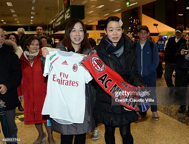 Fan awaits the arrival of AC Milan's new signing Keisuke Honda is seen upon arrival at Milano Malpensa Airport on January 4, 2014 in Milan, Italy.