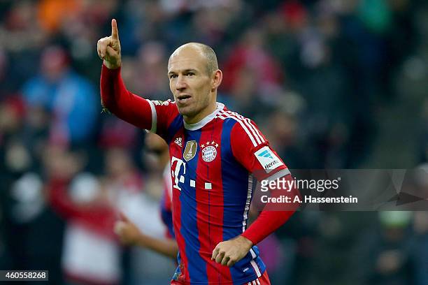 Arje Robben of Muenchen celebrates scoring the opening goal during the Bundesliga match between FC Bayern Muenchen and SC Freiburg at Allianz Arena...