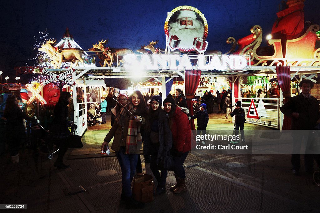 Visitors Enjoy The Winter Wonderland Christmas Themepark In London