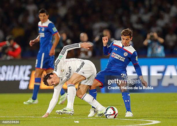 Gareth Bale of Real Madrid and Hernan Bernardello of Cruz Azul compete for the ball during the FIFA Club World Cup Semi Final match between Cruz Azul...